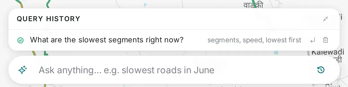 The Ask anything bar at the bottom of the map, with Query history above it showing the question “What are the slowest segments right now?” and the settings it applied: segments, speed, lowest first